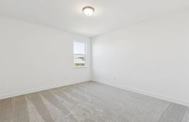 a bathroom with a tub shower sink vanity and a mirror