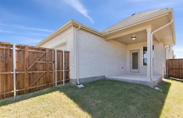 a bathroom with a bathtub and toilet