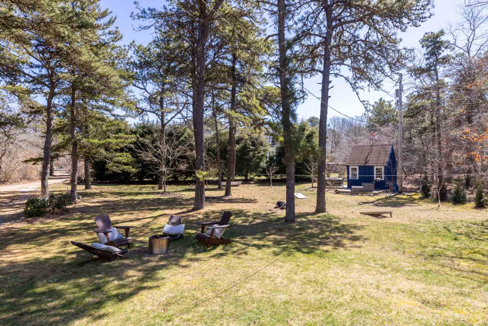 41 Rd To The Plaines Edgartown, MA 02539 - Photo 16 of 19 a view of a yard with swimming pool and trees