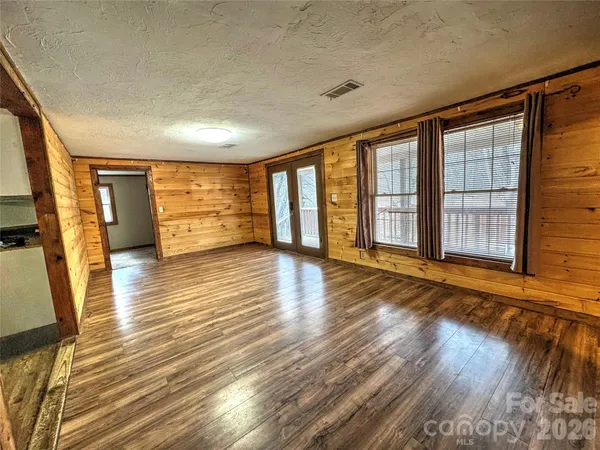 a view of an empty room and window