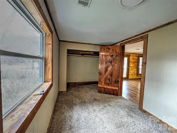 an empty room with windows