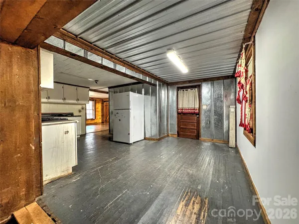a bathroom with a sink a mirror and a bathtub