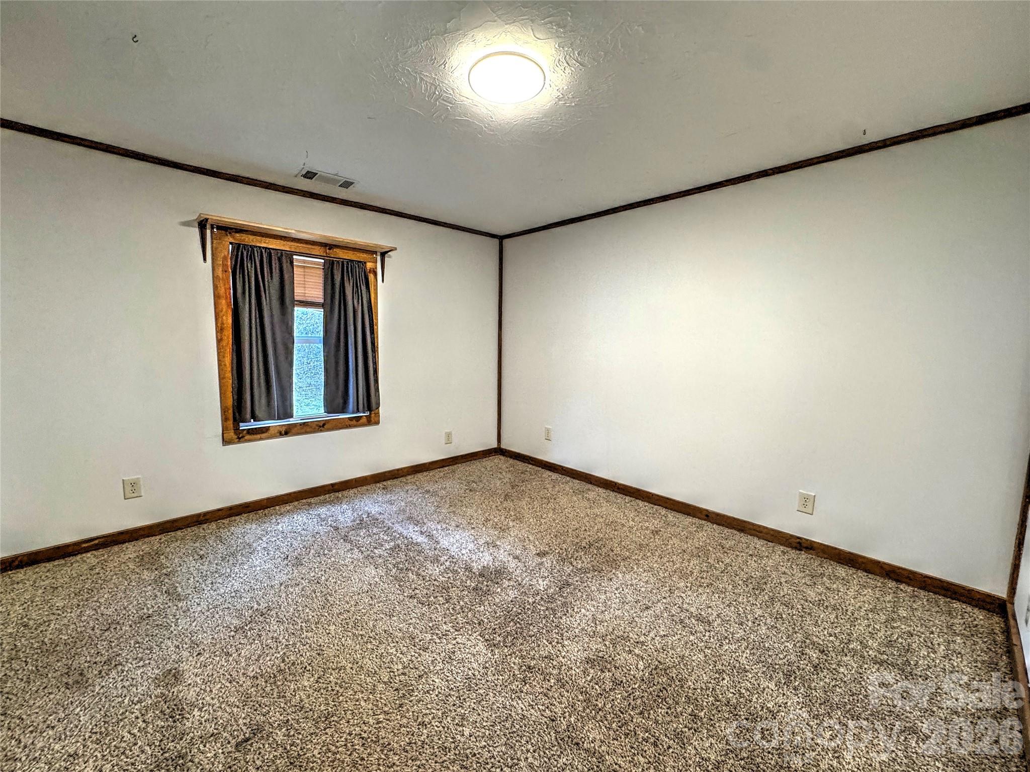 1101 Otter Creek Road Topton, NC 28781 - Photo 32 of 37 an empty room with a window
