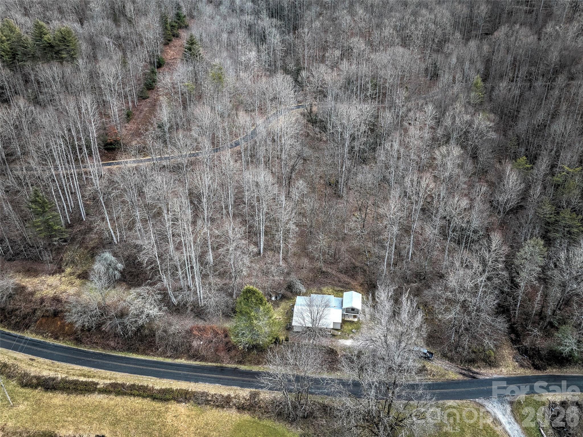 1101 Otter Creek Road Topton, NC 28781 - Photo 7 of 37 a view of swimming pool from a window