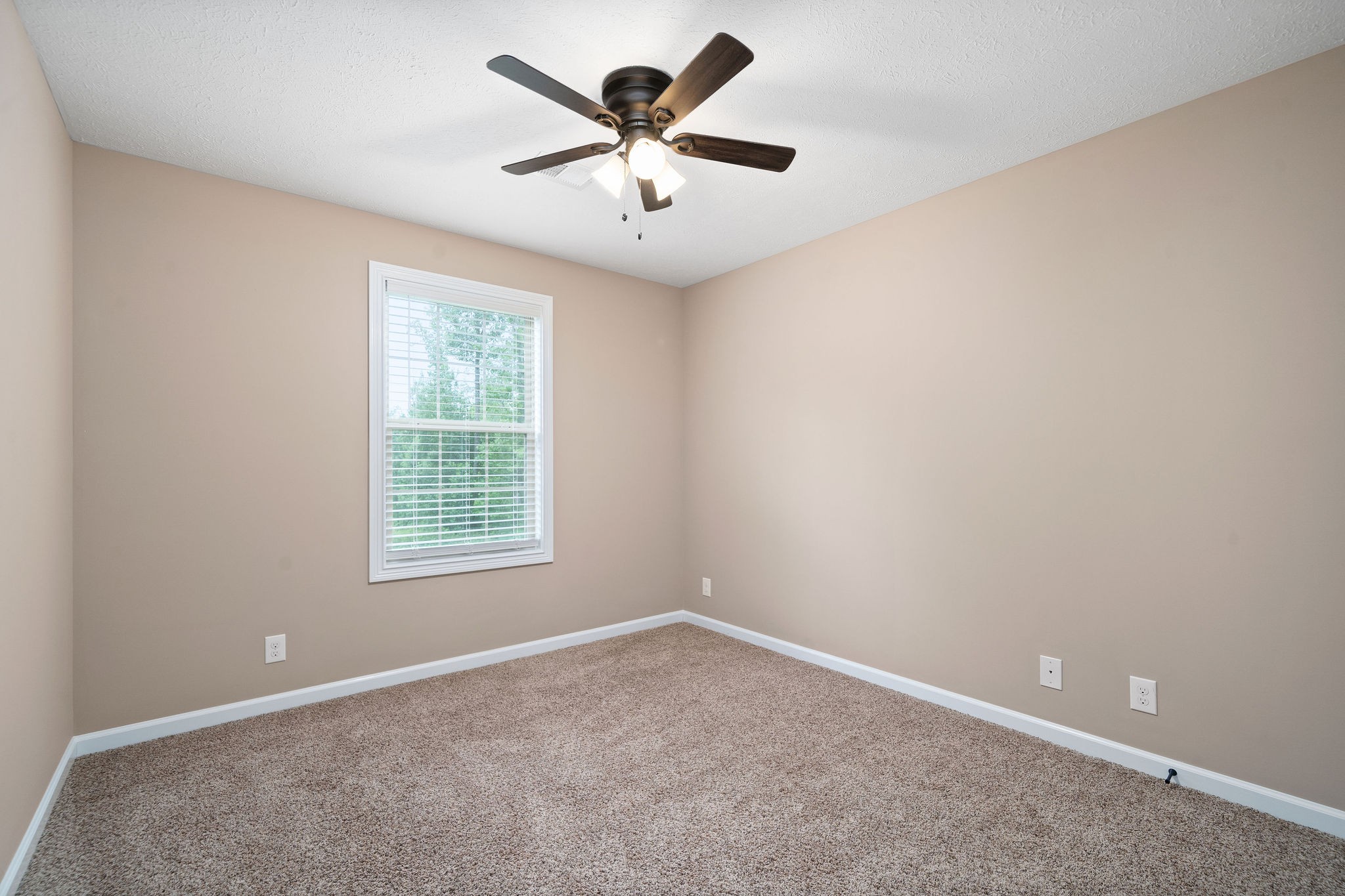 2152 Bend Road Clarksville, TN 37040 - Photo 14 of 36 an empty room with a window and a ceiling fan