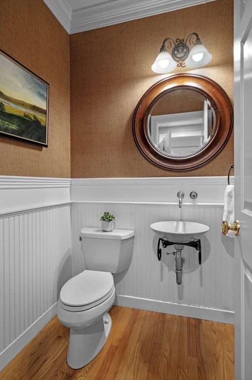 8 Azalea Way Boxford, MA 01921 - Photo 19 of 42 a bathroom with a toilet a sink and a mirror