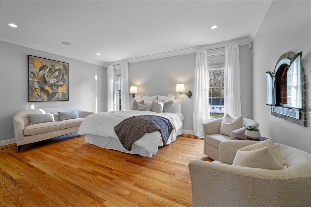 8 Azalea Way Boxford, MA 01921 - Photo 21 of 42 a bedroom with furniture and a large window