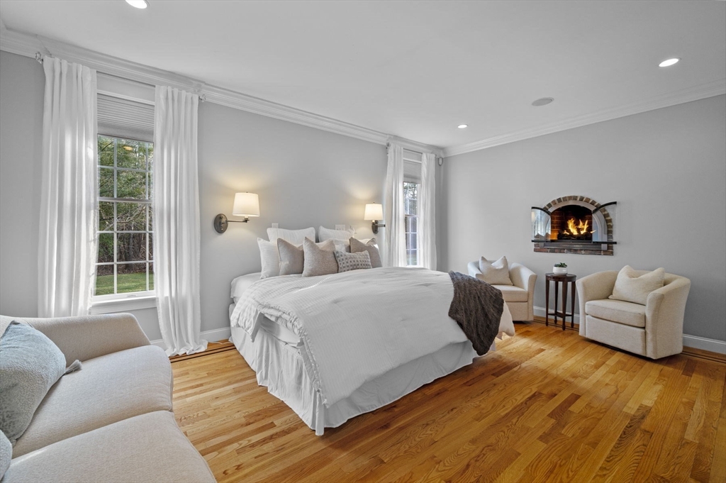 8 Azalea Way Boxford, MA 01921 - Photo 22 of 42 a bedroom with a bed and glass window