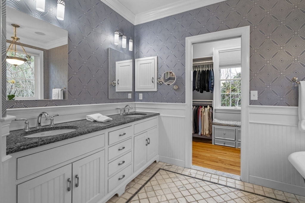 8 Azalea Way Boxford, MA 01921 - Photo 24 of 42 a spacious bathroom with a granite countertop sink a toilet a mirror and shower