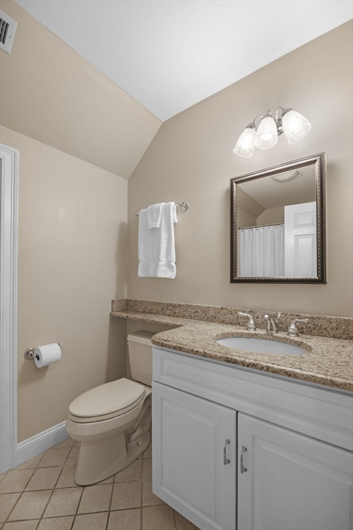 8 Azalea Way Boxford, MA 01921 - Photo 32 of 42 a bathroom with a granite countertop toilet sink mirror and vanity