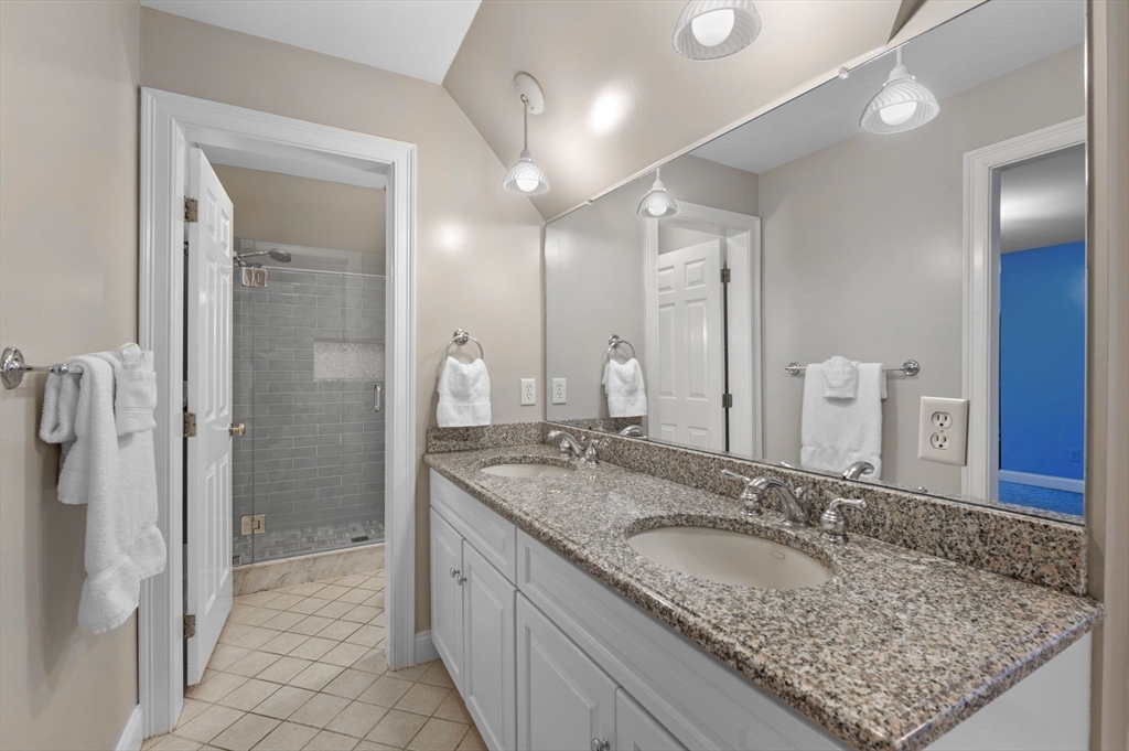 8 Azalea Way Boxford, MA 01921 - Photo 34 of 42 a bathroom with a granite countertop sink and a mirror