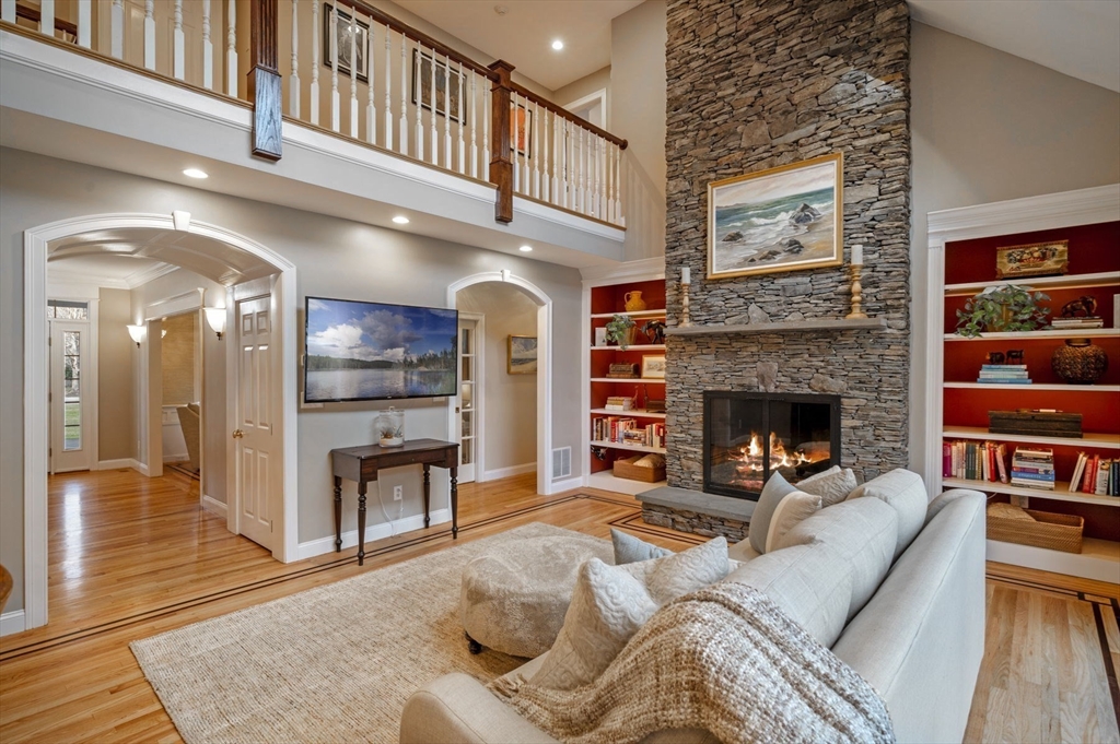 8 Azalea Way Boxford, MA 01921 - Photo 7 of 42 a living room with furniture and a fireplace