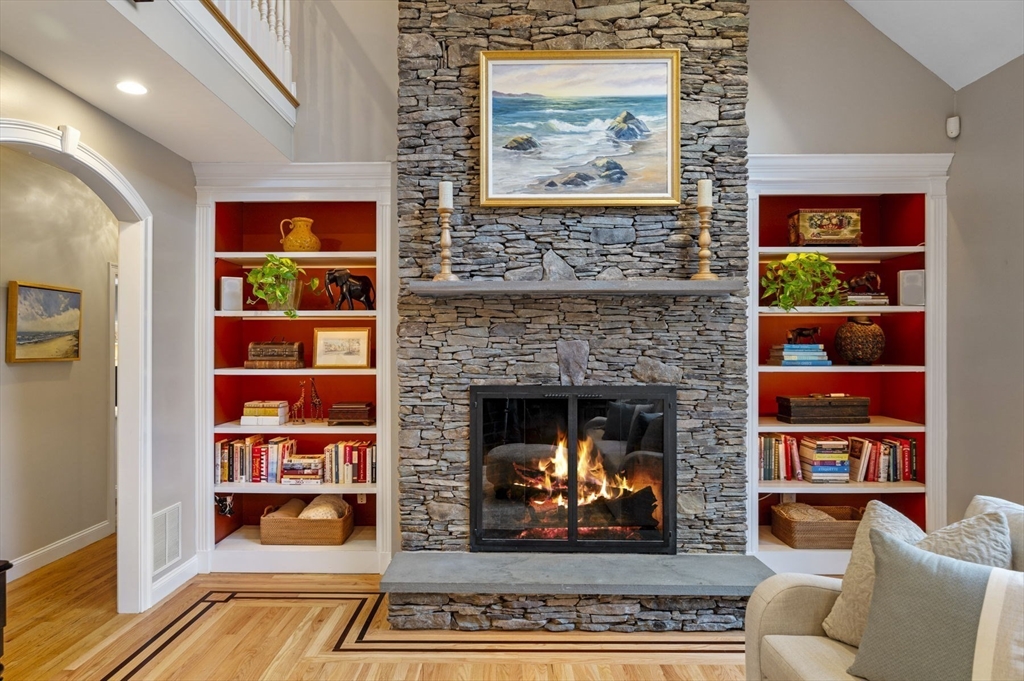8 Azalea Way Boxford, MA 01921 - Photo 8 of 42 a living room with furniture and a fireplace