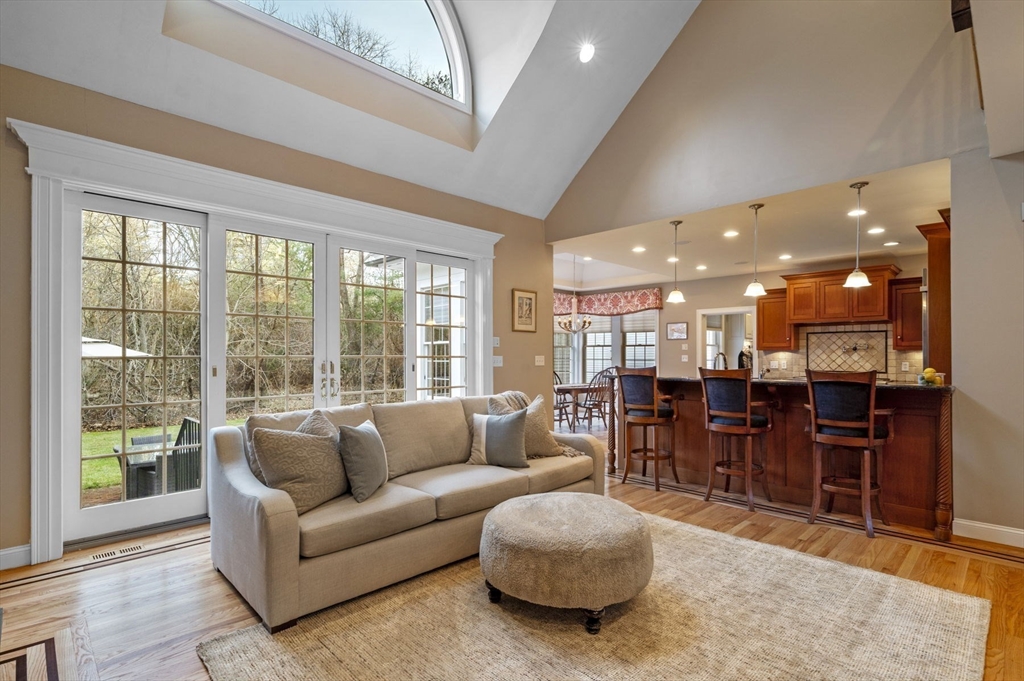 8 Azalea Way Boxford, MA 01921 - Photo 10 of 42 a living room with furniture kitchen area and a large window