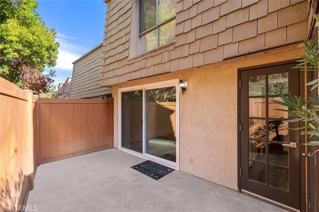 a view of a backyard of a house