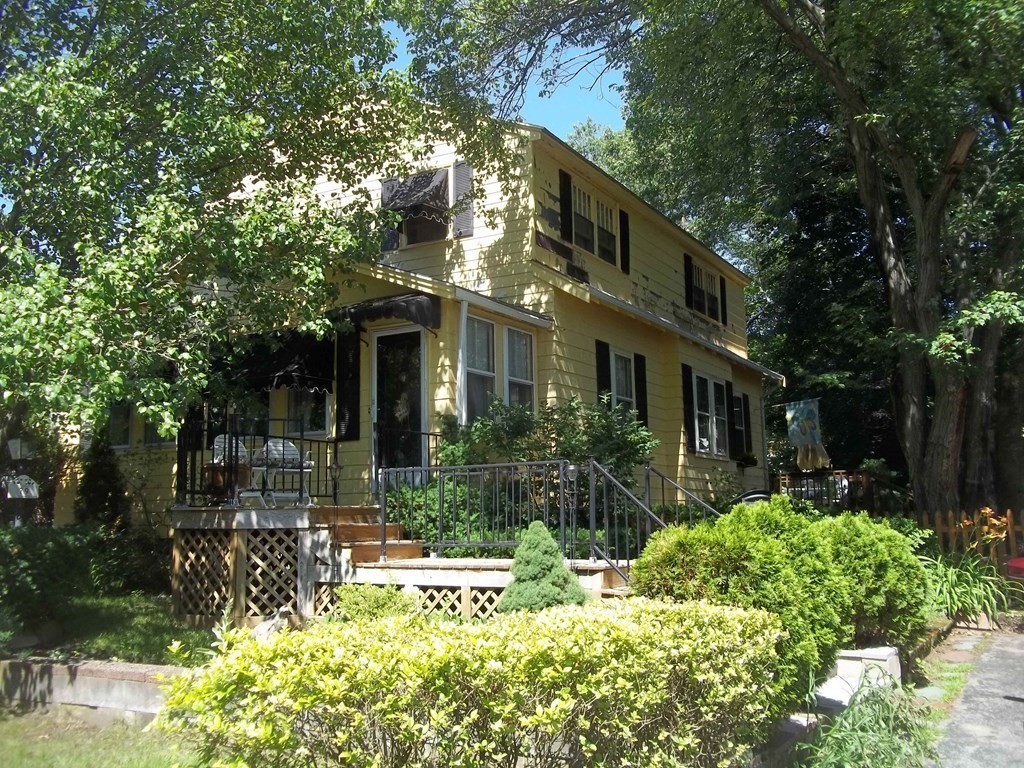 79 Holmes Road Dedham, MA 02026 - Photo 2 of 3 a view of house with yard and outdoor space