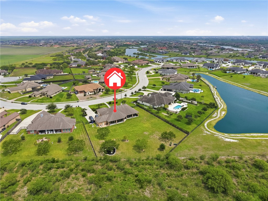 8710 KIng Ranch Drive Corpus Christi, TX 78414 - Photo 31 of 38 an aerial view of a house with a swimming pool yard and outdoor seating