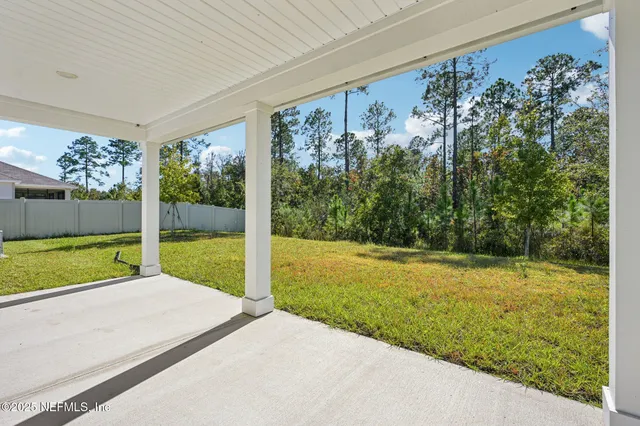 a view of a backyard with garden