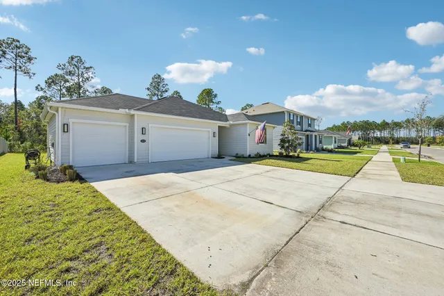 a view of backyard of a house