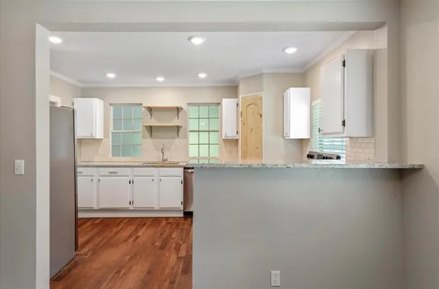 a bathroom with a sink a mirror and a bathtub