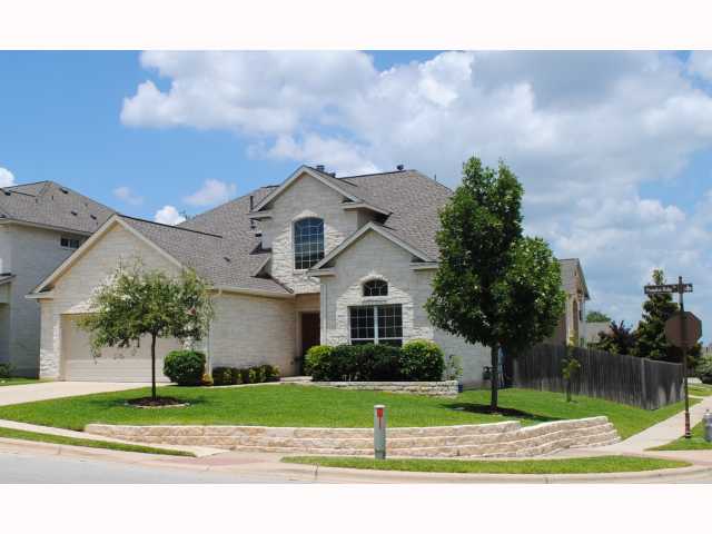 15616 Pumpkin Ridge Drive Austin, TX 78717 - Photo 1 of 1 a front view of a house with a yard and garage