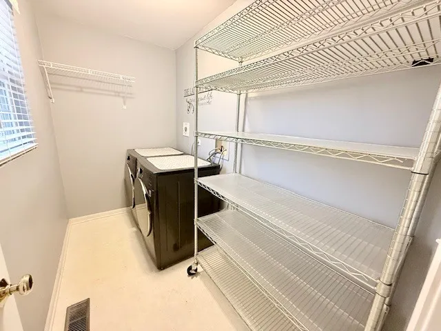 a room with storage and utility