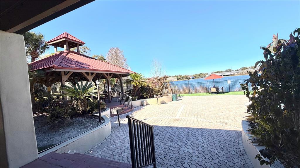 232 Afton Square, Unit 309 Altamonte Springs, FL 32714 - Photo 20 of 26 a view of outdoor space yard deck patio and outdoor kitchen
