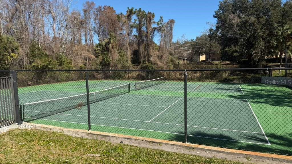 232 Afton Square, Unit 309 Altamonte Springs, FL 32714 - Photo 25 of 26 a view of a tennis court