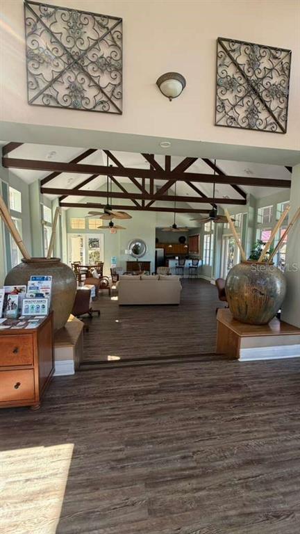 232 Afton Square, Unit 309 Altamonte Springs, FL 32714 - Photo 26 of 26 a living room with furniture and wooden floor