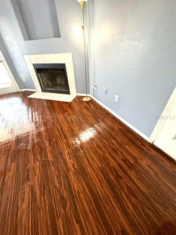 232 Afton Square, Unit 309 Altamonte Springs, FL 32714 - Photo 7 of 26 a view of empty room with wooden floor