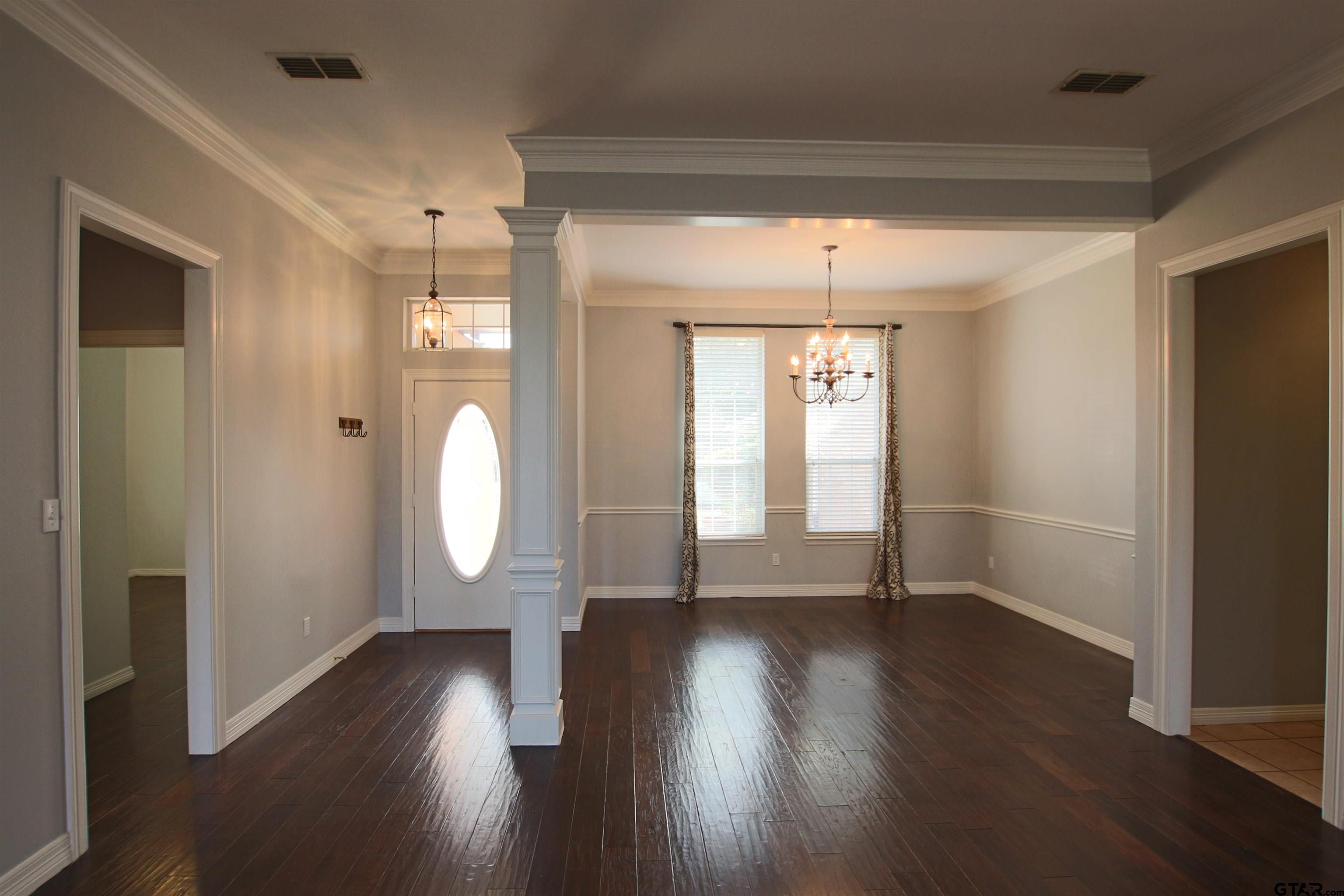5707 Nicholson Drive Tyler, TX 75707 - Photo 2 of 23 a view of a room with wooden floor and window