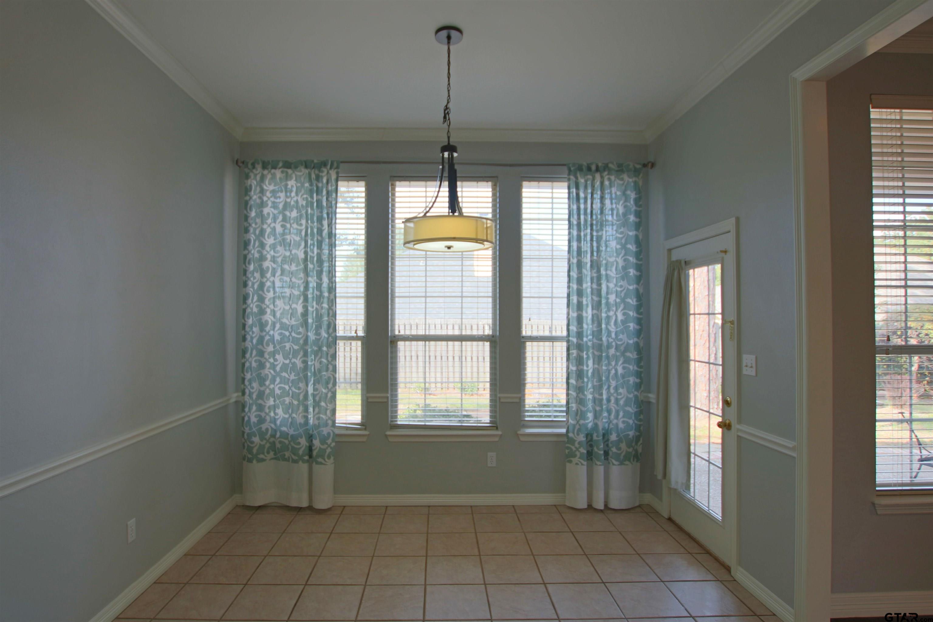 5707 Nicholson Drive Tyler, TX 75707 - Photo 7 of 23 a view of an empty room with a window