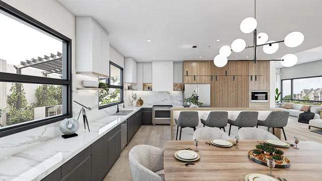 a large kitchen with a large window and stainless steel appliances