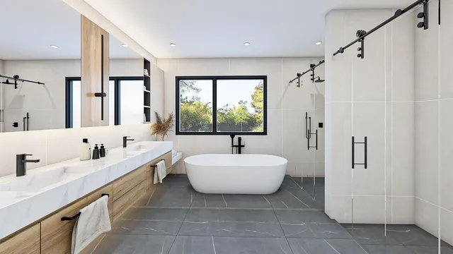 a spacious bathroom with a bathtub sink and mirror