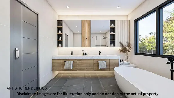 a spacious bathroom with a tub double vanity and window