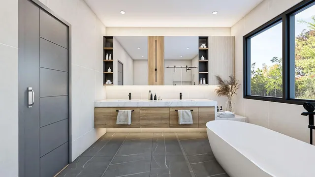 a spacious bathroom with a tub sink and mirror