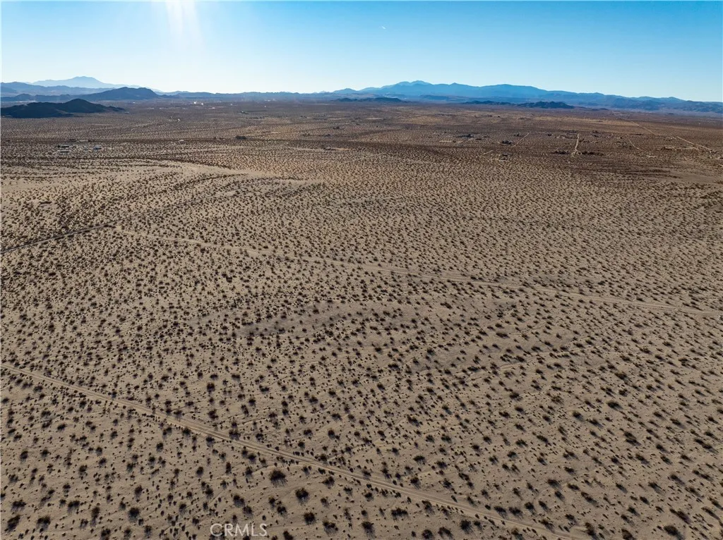 0 Saturn Drive Joshua Tree, CA 92252 - Photo 12 of 23 a view of a field with an ocean view