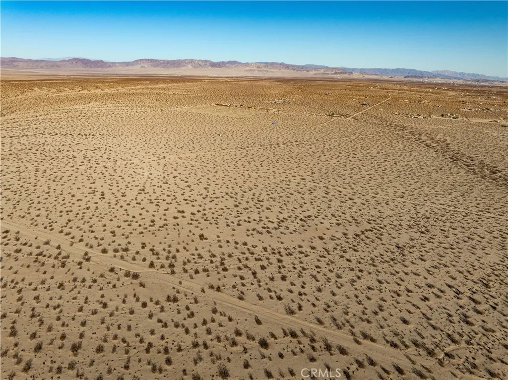 0 Saturn Drive Joshua Tree, CA 92252 - Photo 16 of 23 a view of an ocean and beach