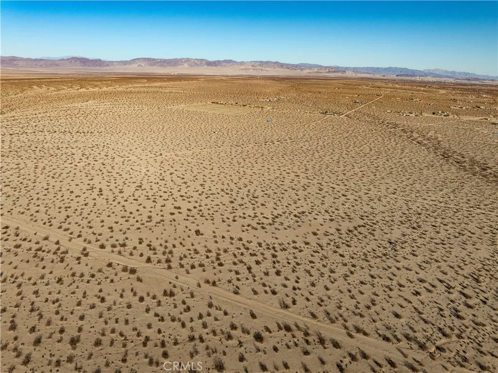 0 Saturn Drive Joshua Tree, CA 92252 - Photo 16 of 23 a view of an ocean and beach