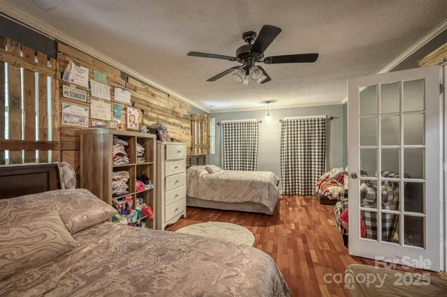 a spacious bathroom with a toilet sink and mirror
