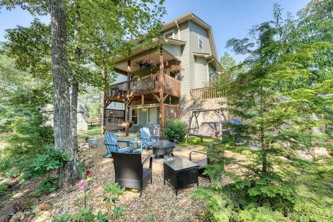 87 Harbin Court Morganton, GA 30560 - Photo 11 of 63 a view of a house with backyard and sitting area