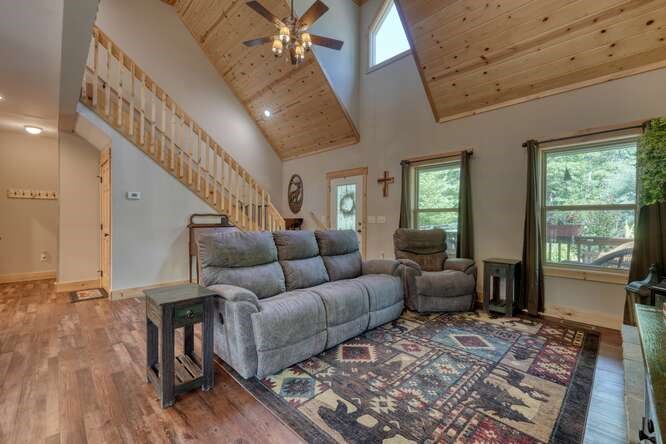 87 Harbin Court Morganton, GA 30560 - Photo 16 of 63 a living room with furniture and a rug