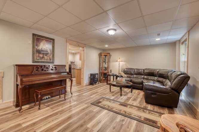 87 Harbin Court Morganton, GA 30560 - Photo 4 of 63 a living room with furniture a piano and a piano