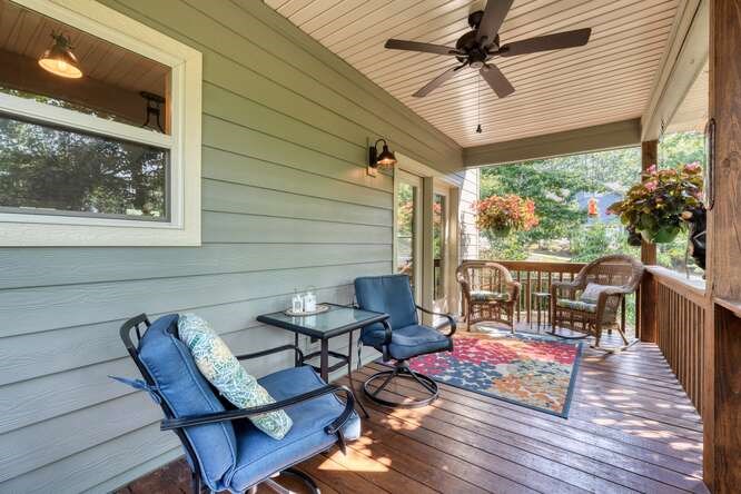 87 Harbin Court Morganton, GA 30560 - Photo 45 of 63 a balcony with furniture and wooden floor