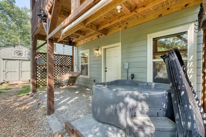 87 Harbin Court Morganton, GA 30560 - Photo 47 of 63 a view of a porch with wooden fence and a bench