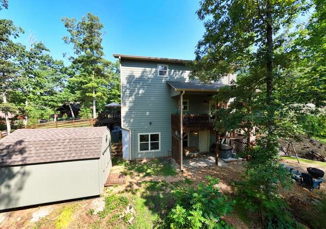 87 Harbin Court Morganton, GA 30560 - Photo 54 of 63 aerial view of a house with a tree