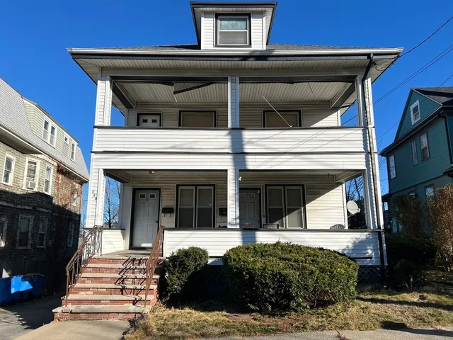 a view of a building with entrance gate