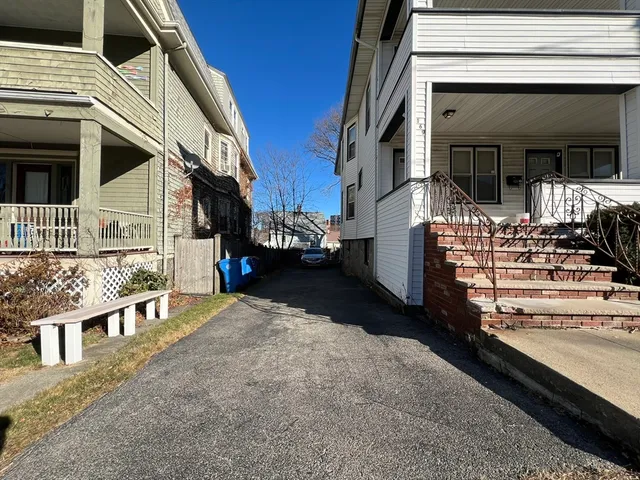 a view of a house with a street