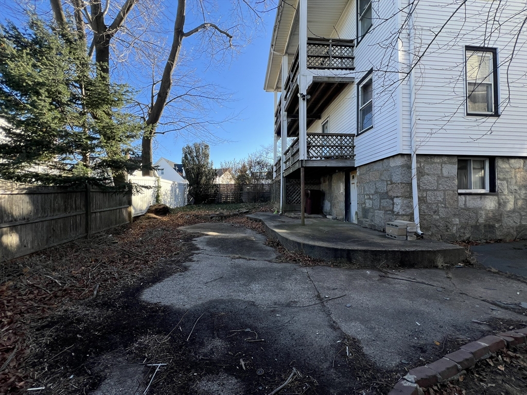 169 Grovers Avenue Winthrop, MA 02152 - Photo 9 of 31 a view of a house with a yard