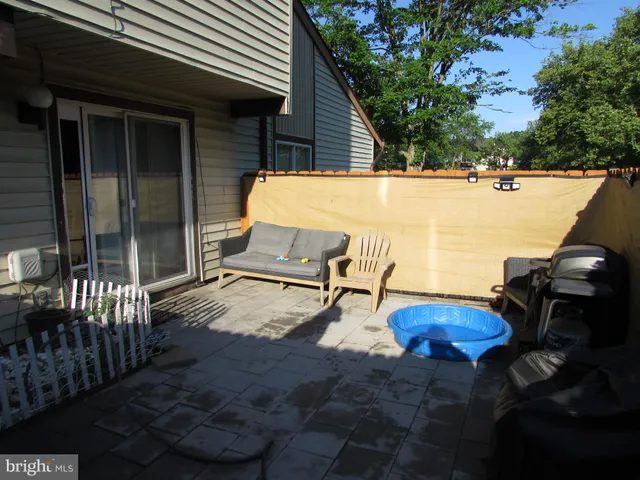 an outdoor space with furniture